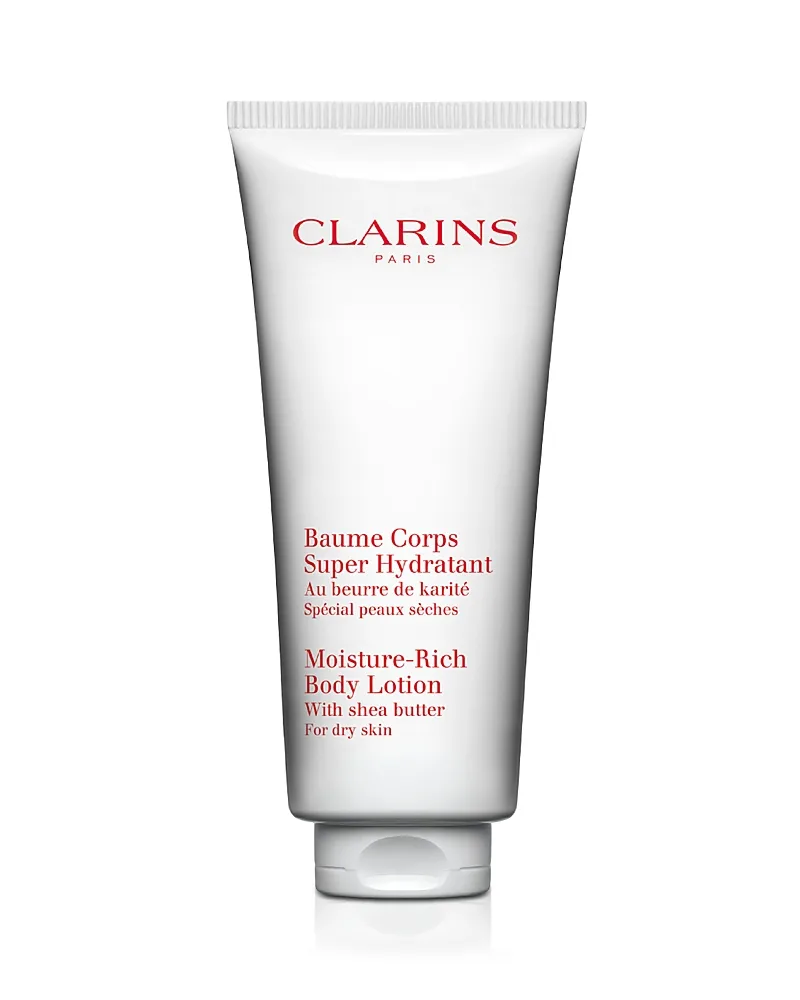 Clarins by Clarins Moisture Rich Body Lotion ( For Dry Skin )-200ml/6.5OZ for WOMEN