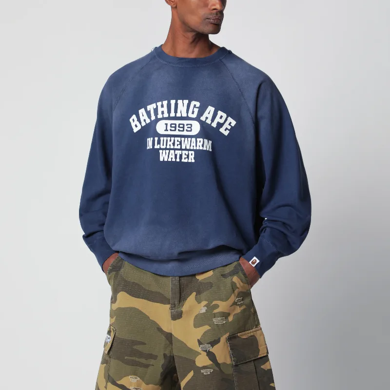 Faded navy blue sweatshirt with logo print